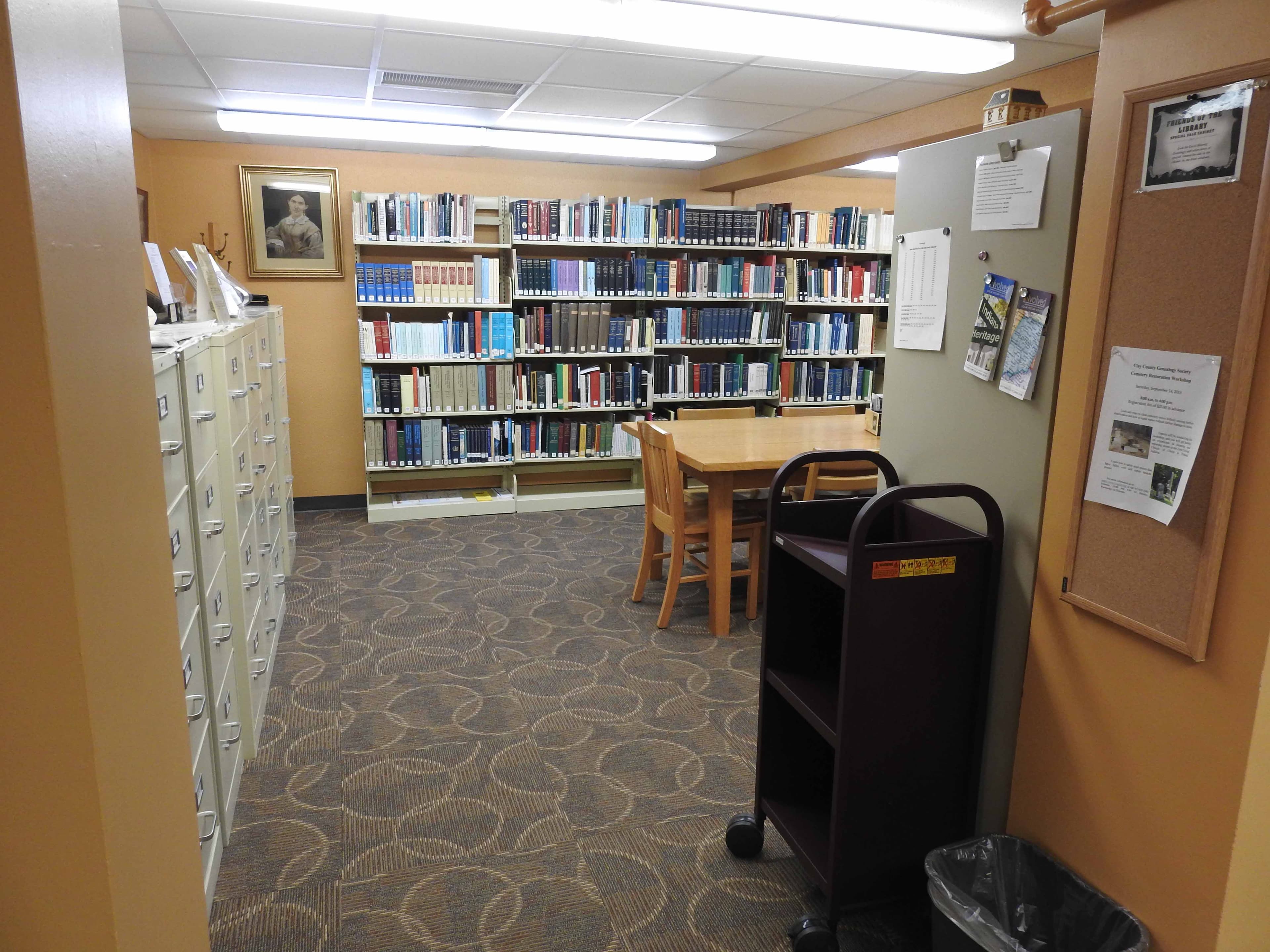 Inside the Owen County Public Library archive vault — shelving with historical records and the heavy vault door.