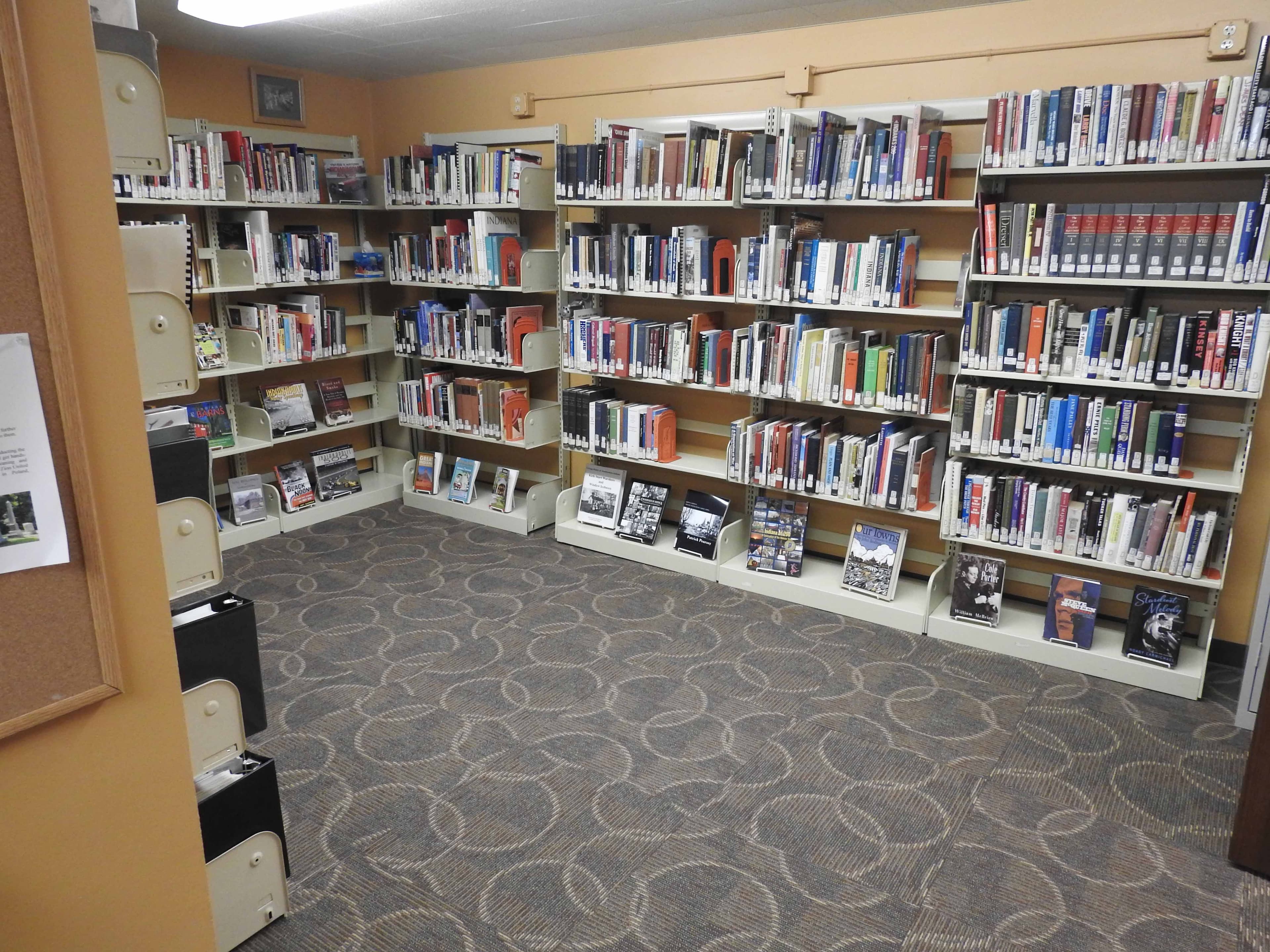 Indiana Section shelves — Hoosier authors, artists, and Indiana history.