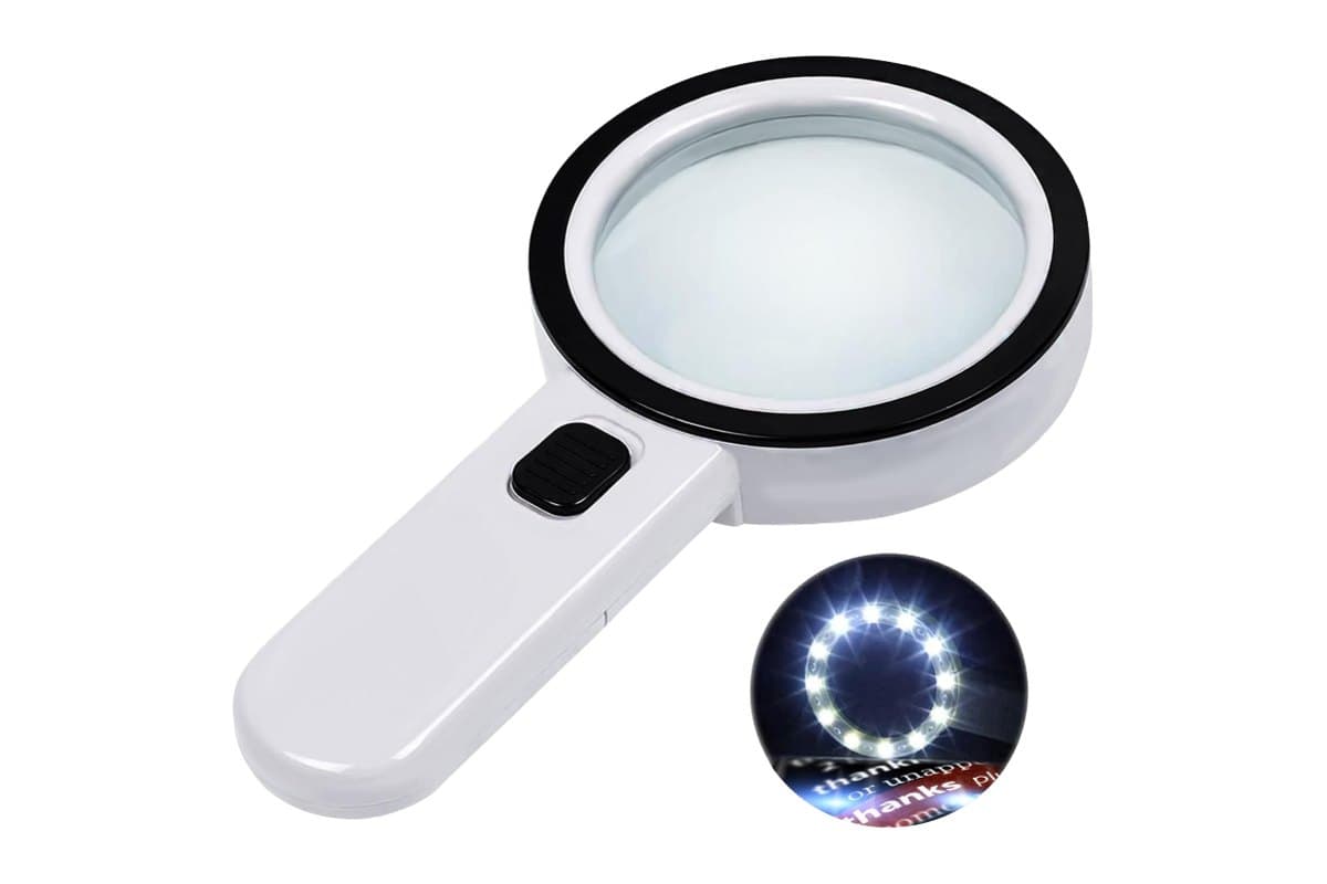 Large white handheld magnifying glass with a ring of LED lights